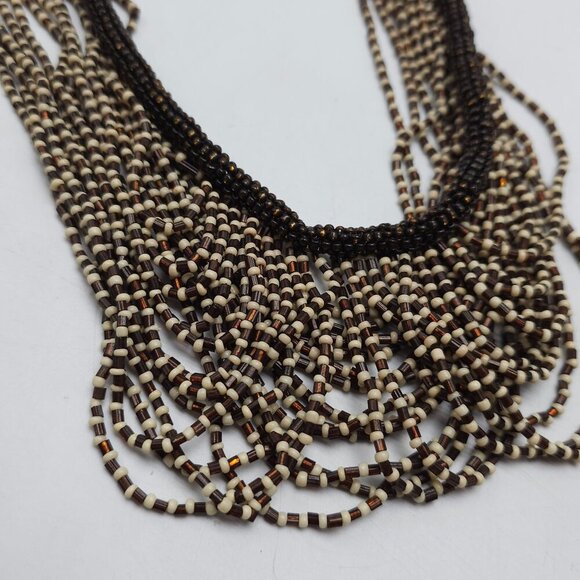 Handcrafted Brown Tan Multi-Strand Beaded Bib Necklace With Earthy Tones - Picture 2 of 5